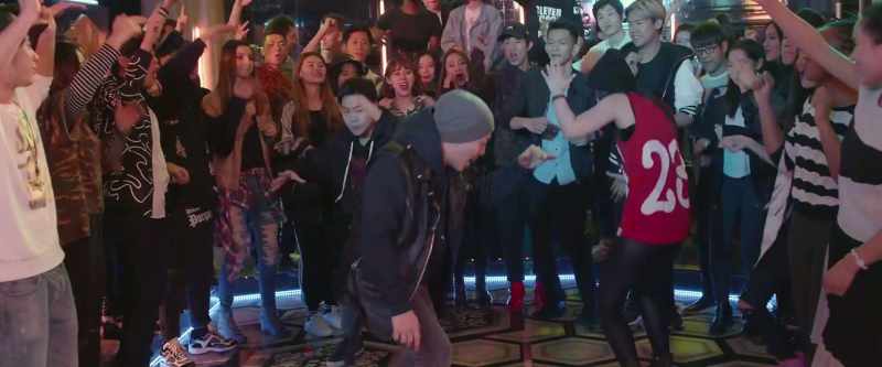 [dance music playing]
