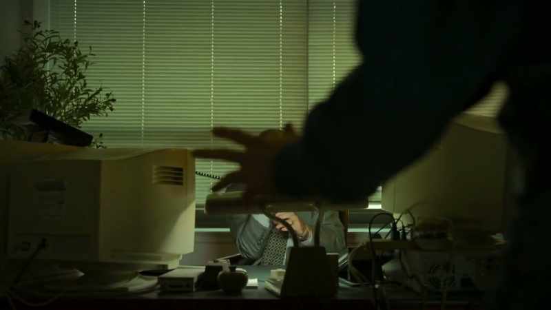 Dark. Darkly lit. He always had three screens