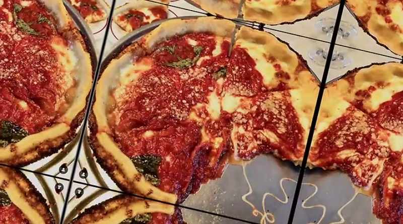 Deep-dish pizza is baked in a round pan