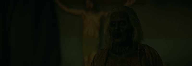 [demonic voices echoing]