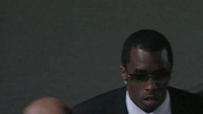 Diddy was surrounded by an entourage filled with