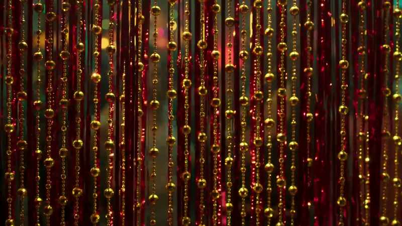 [disco music playing]
