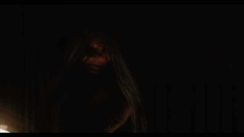 [distorted and garbled speech] [dark music continues]