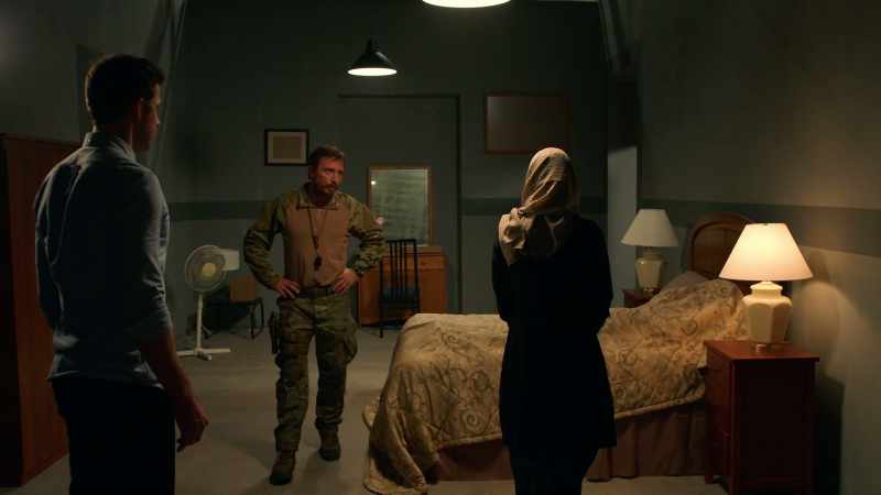 Does he sleep with a weapon near the bed?