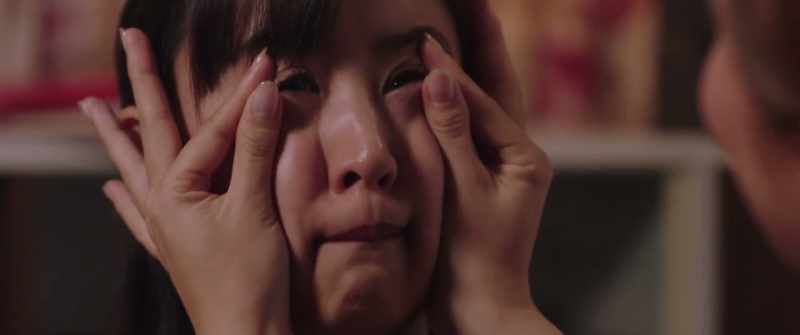 Don't laugh! Make a sad face! Look sad!