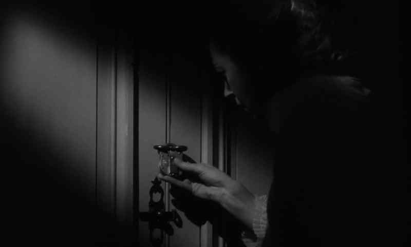 [door latch clangs]