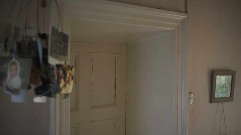 (door lock clicking)