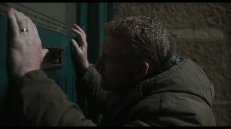 (door lock rattles)