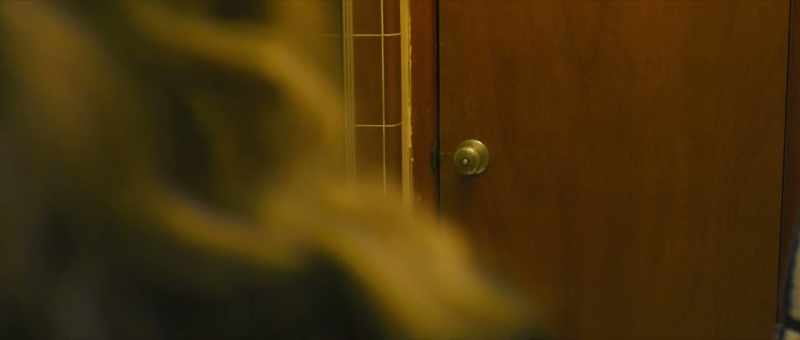 (door rattles)