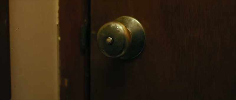 (door rattles)