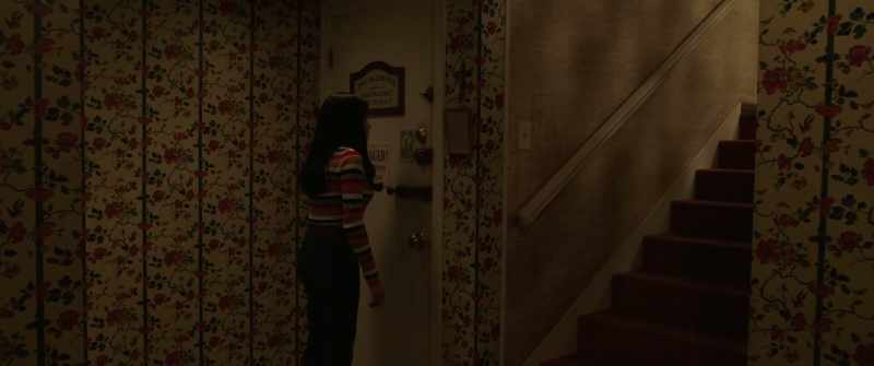 [door rattles]