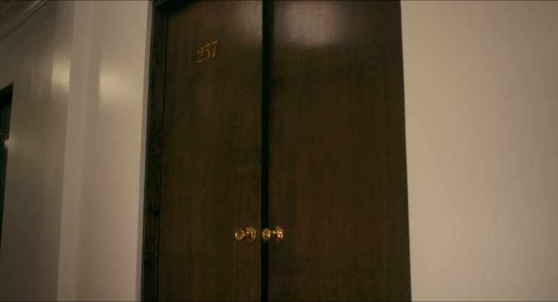 [doorknob squeaking]