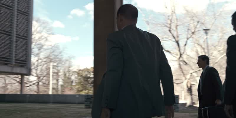 Dr. Brenner. This way, gentlemen. The entire east wing will be evacuated within the hour. We've seal