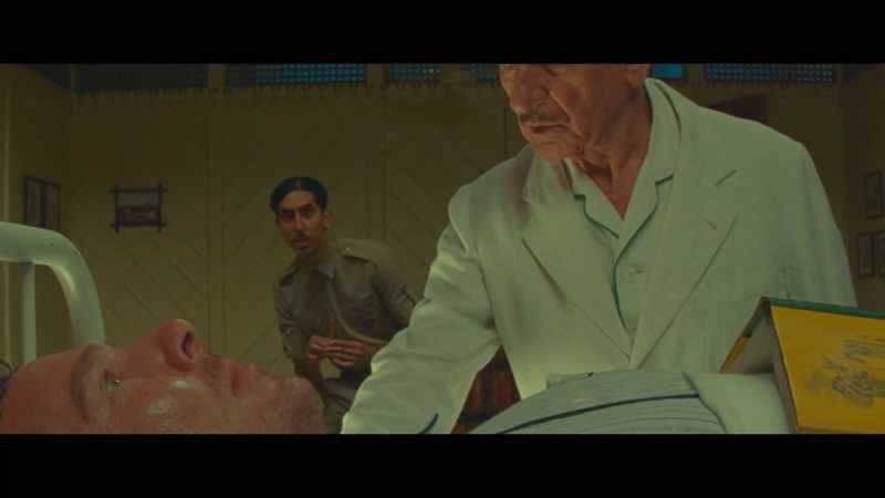 Dr. Ganderbai cautiously rolled up Harry's sleeve
