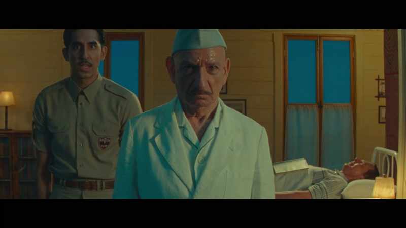 Dr. Ganderbai watched Harry's face