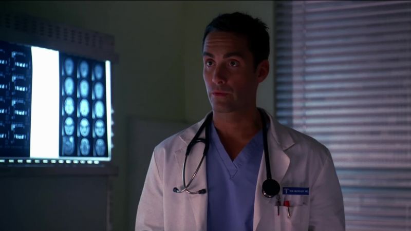 (Dr. Ron) IS SHE TRYING TO PUT ON THE DUST COVER?