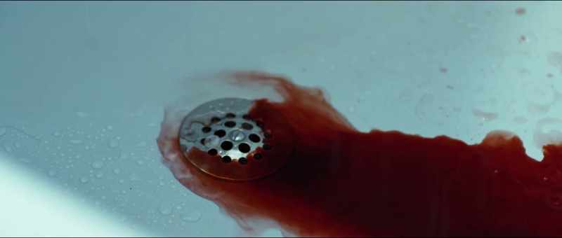 (dramatic music) (water trickling)