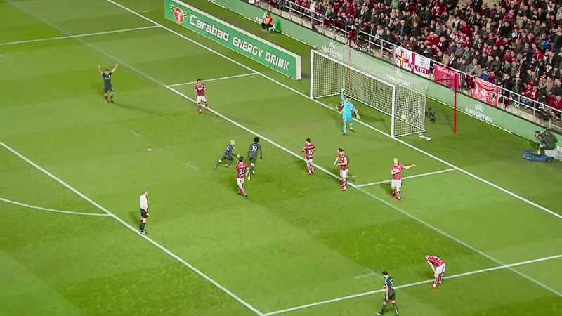 Drives it in front and it takes a deflection into the net