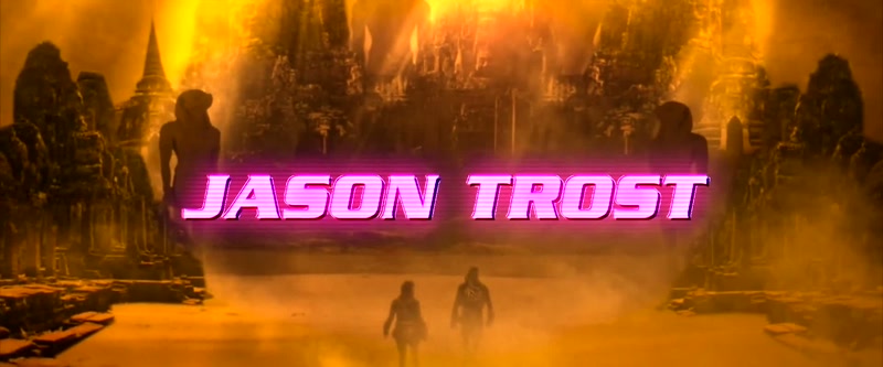 (driving rock-synth music)