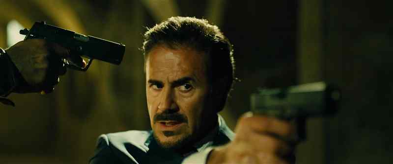 Drop your gun... or I shoot your friend