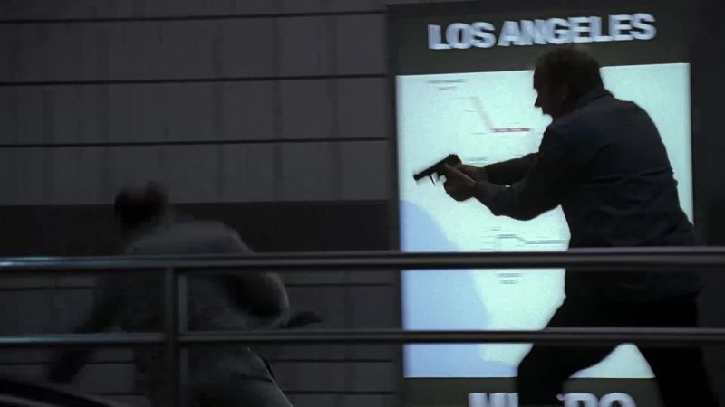 Drop the bag! Get on the ground, now! Don't move!