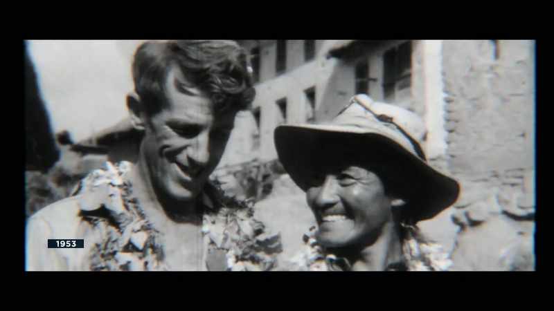 Edmund Hillary and Tenzing Norgay set foot where man has before