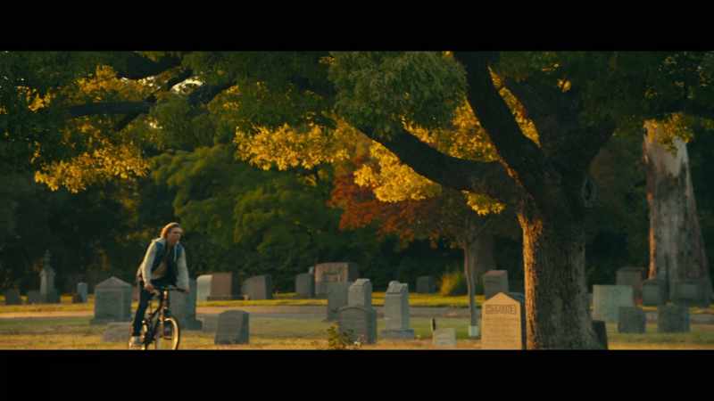 (eerie music) (bicycle whirring)