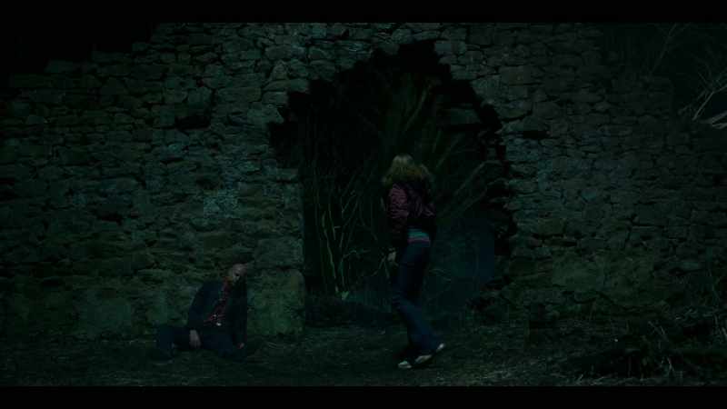 [eerie music playing]