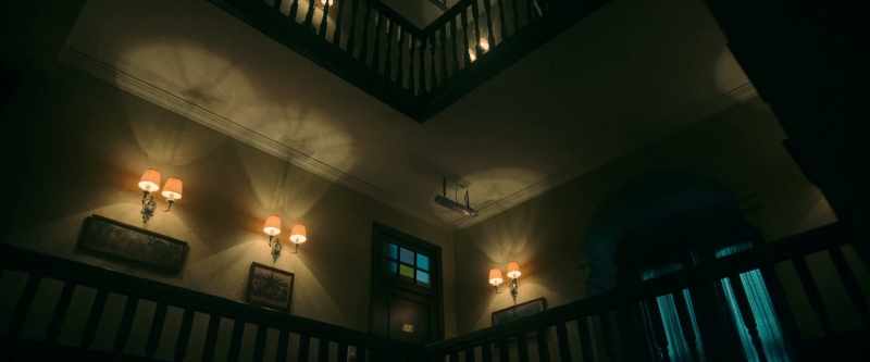 [eerie music playing]