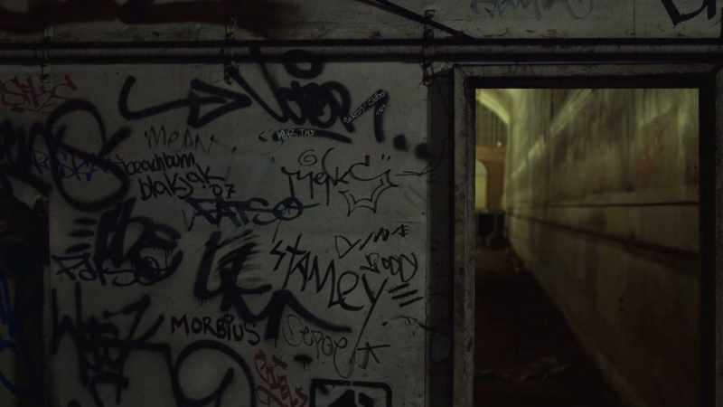 [eerie music playing]