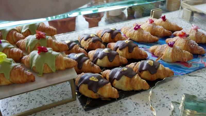 Egg and cheese croissants with a dukkah-nod