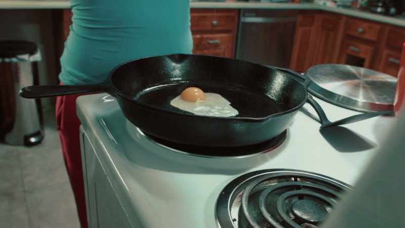 (egg sizzles)