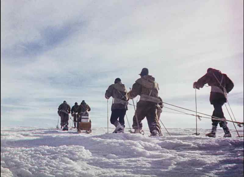 'Eight men with two sledges, man-hauling.'