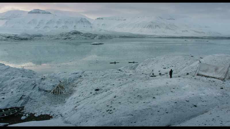 [ELDER INUK SINGS IN INUKTITUT]