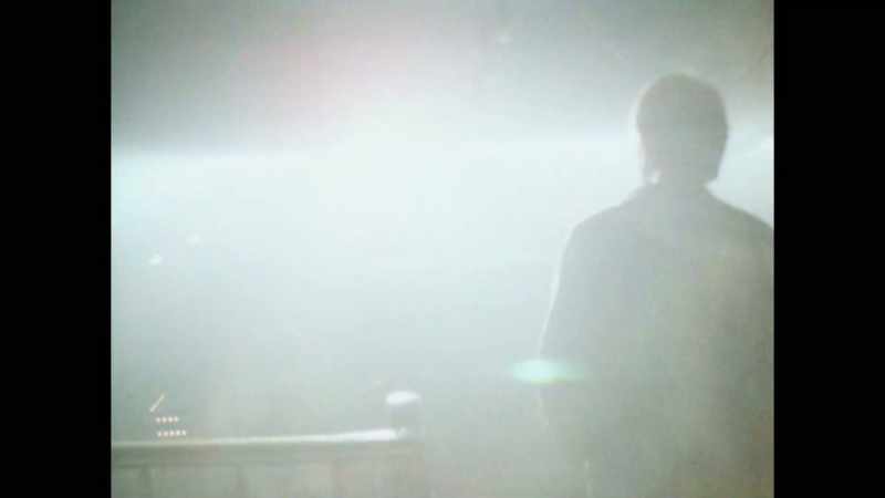 [electronic music playing]