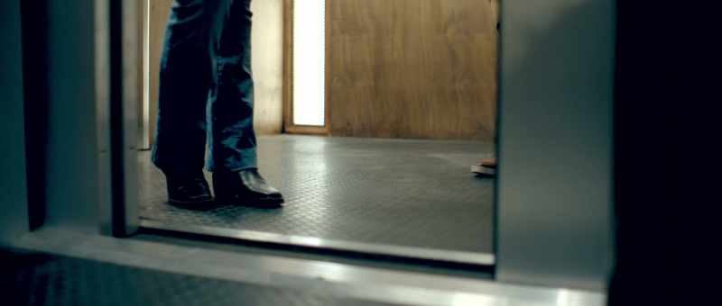 [ Elevator bell dings ]