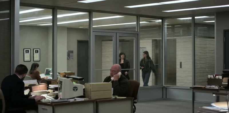 [elevator bell dings]