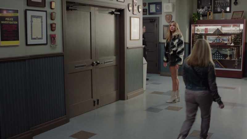 [ Elevator bell dings ]