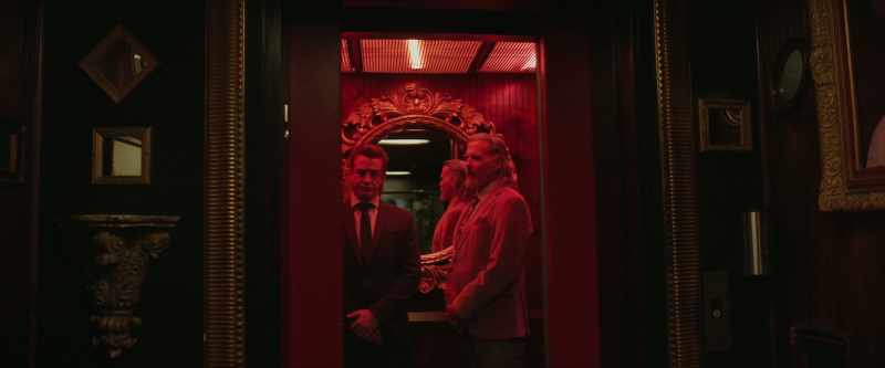 [elevator bell dings]