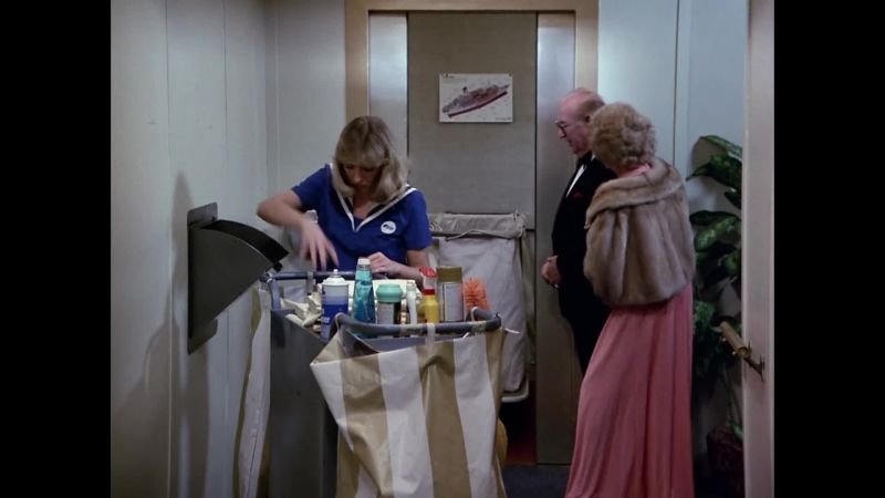 [ Elevator bell dings ]
