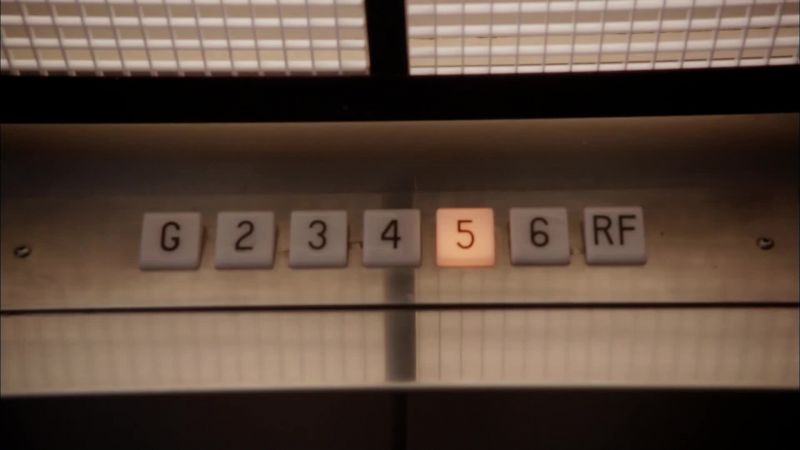 [elevator bell dings]