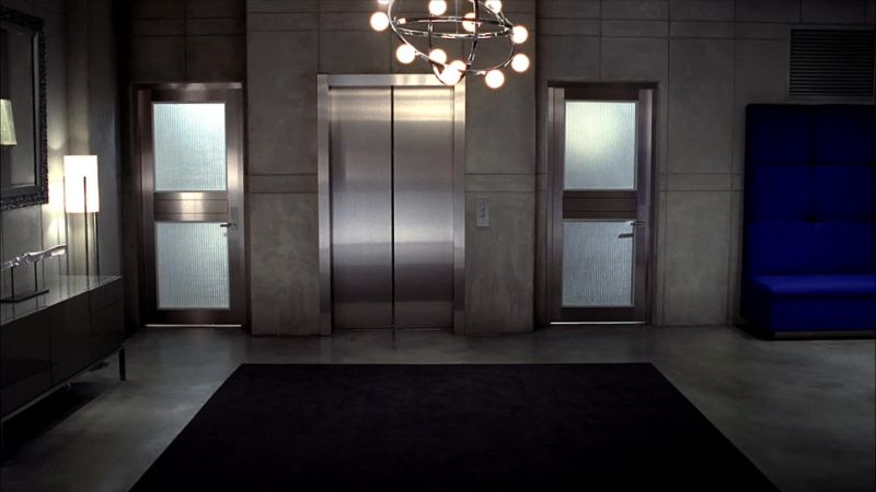 [ELEVATOR BELL DINGS]