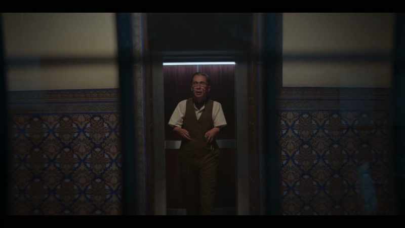 [elevator bell dings]