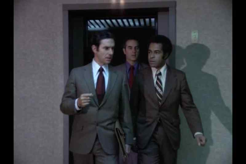 (elevator bell dings)