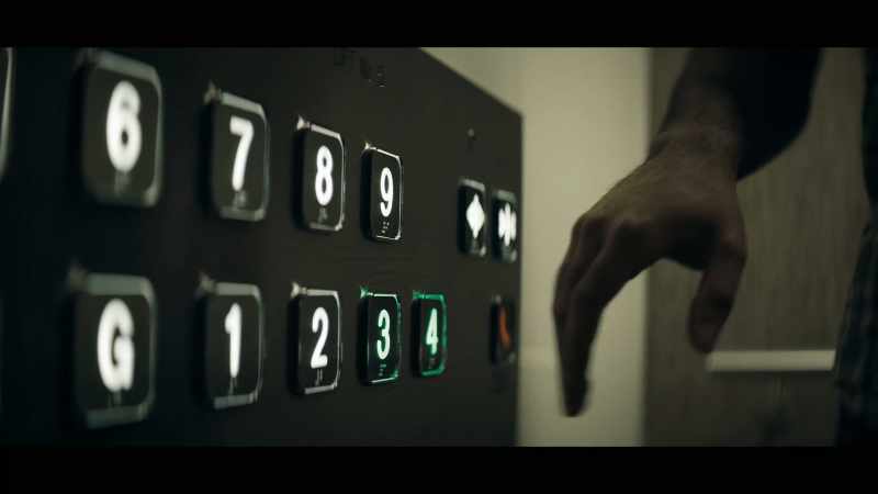 [elevator rumbling]
