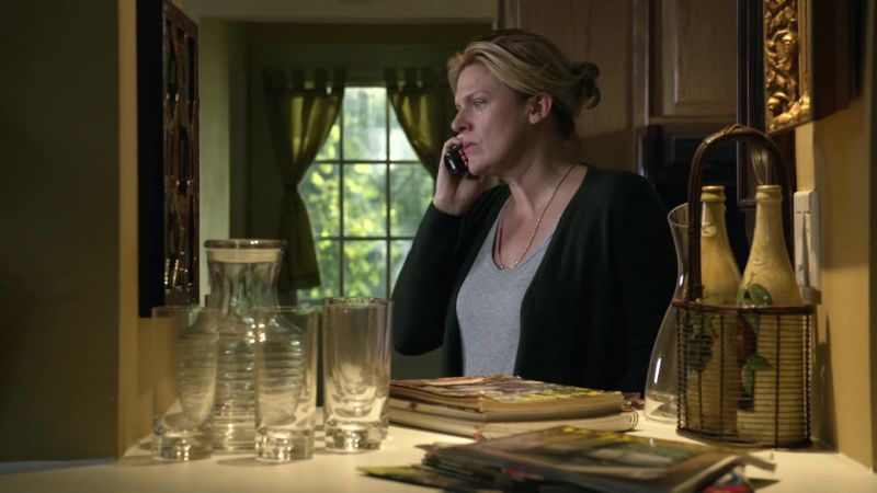 ELIZABETH [OVER PHONE]: Hello?