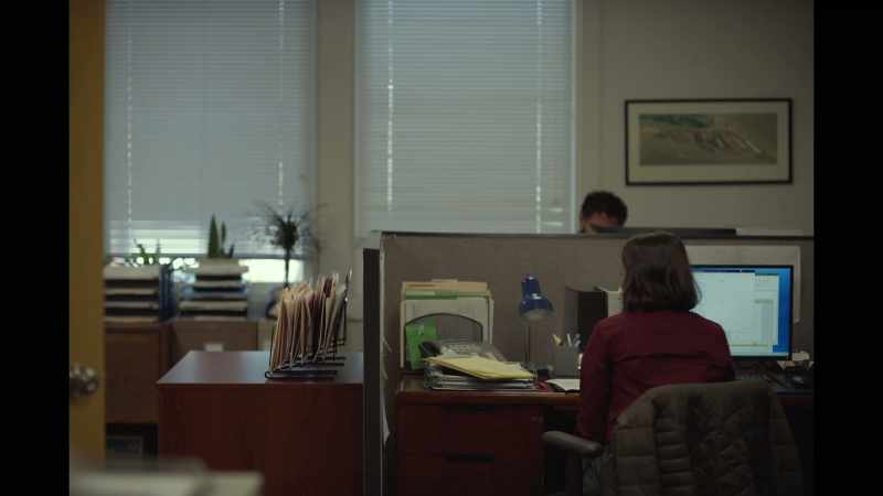 (employees continue conversing)