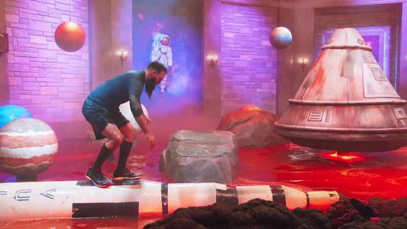 Facing a tricky four-foot jump from a wobbly rocket to a space rock