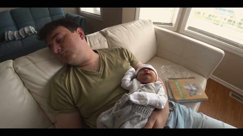 Father and son, both of them sleeping