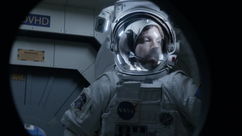 FEMALE VOICE: Air lock engaging
